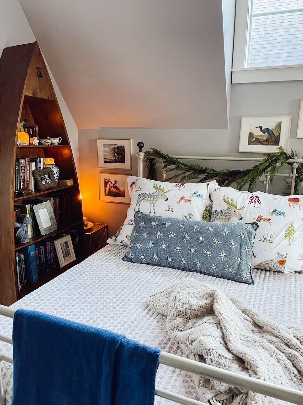 Whimsical Winter Bed for Guests: Little Bits of Progress in The Snug 71 cozy guest room cottage boat shaped bookshelf christmas shams the inspired room